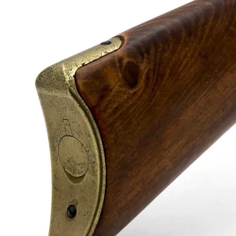 Denix Winchester 1873 replika, nærbilde av kolbeplaten i gull
